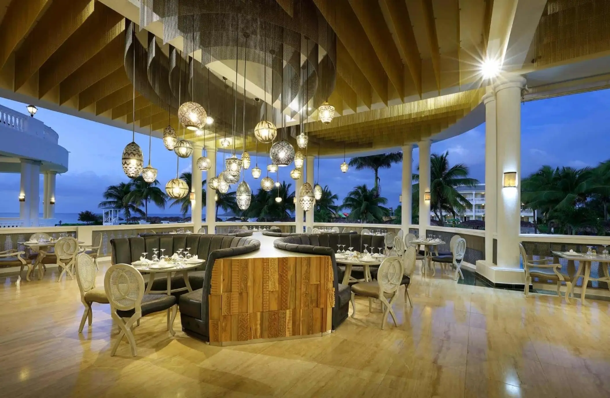 Infinity Salon bar and lounge with globe lighting at Grand Palladium Jamaica, Ocho Rios