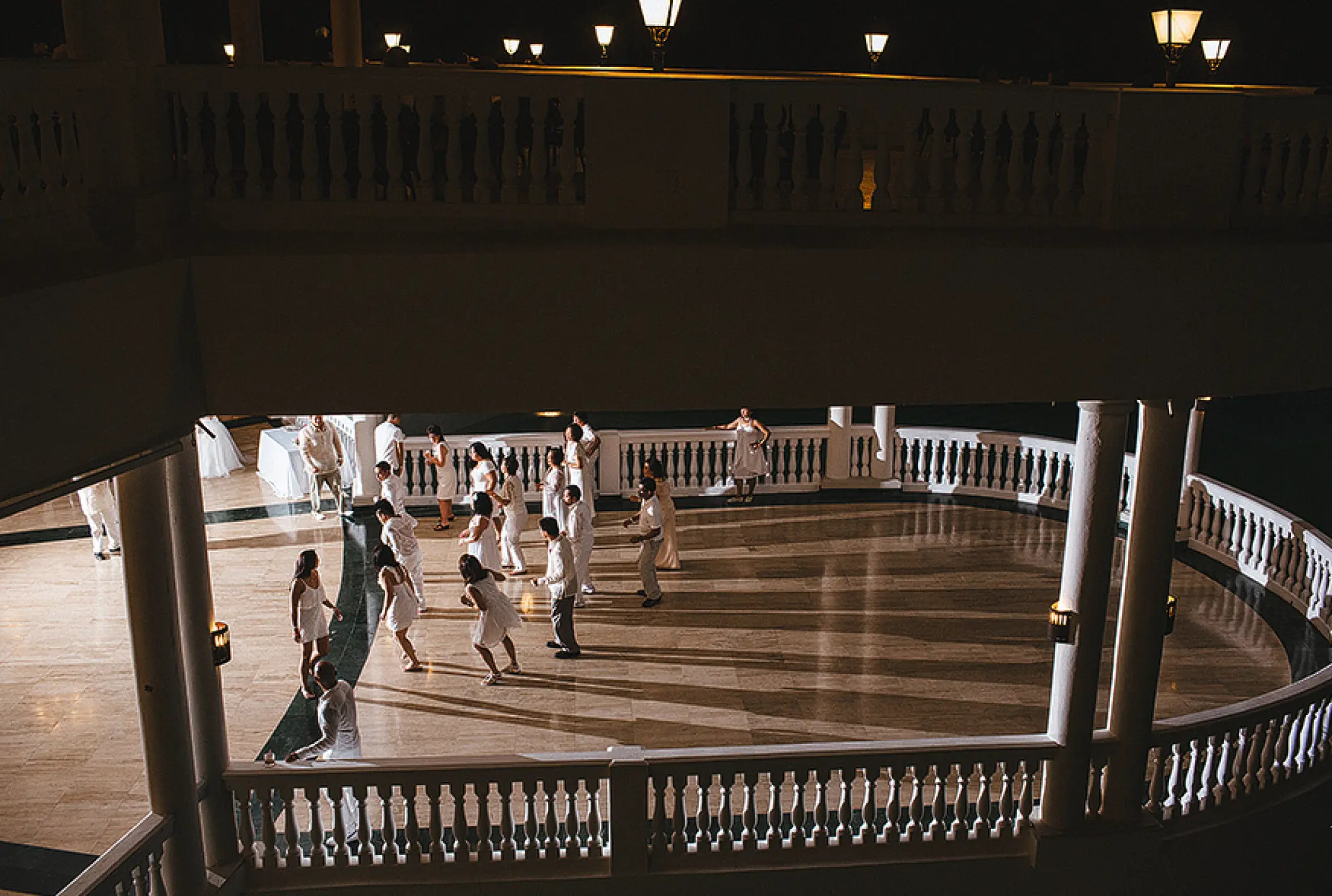 Outdoor wedding reception with guests dancing at Grand Palladium Jamaica, Ocho Rios