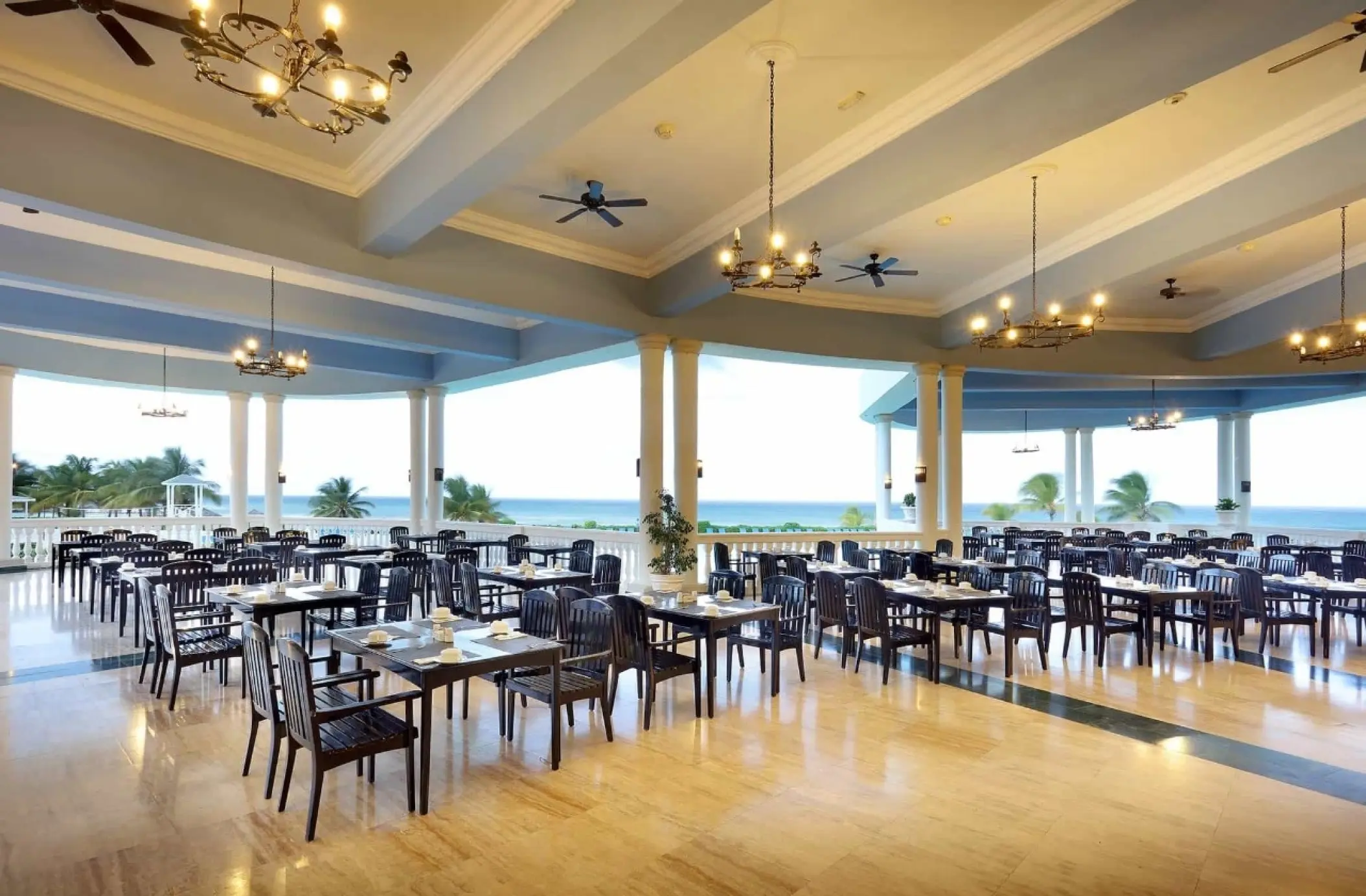 Open-air restaurant terrace with ocean views at Grand Palladium Jamaica, Ocho Rios