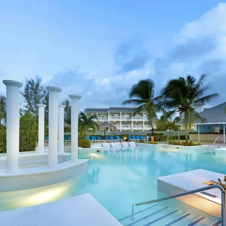 White Roman columns in the main pool at Grand Palladium Jamaica, Ocho Rios