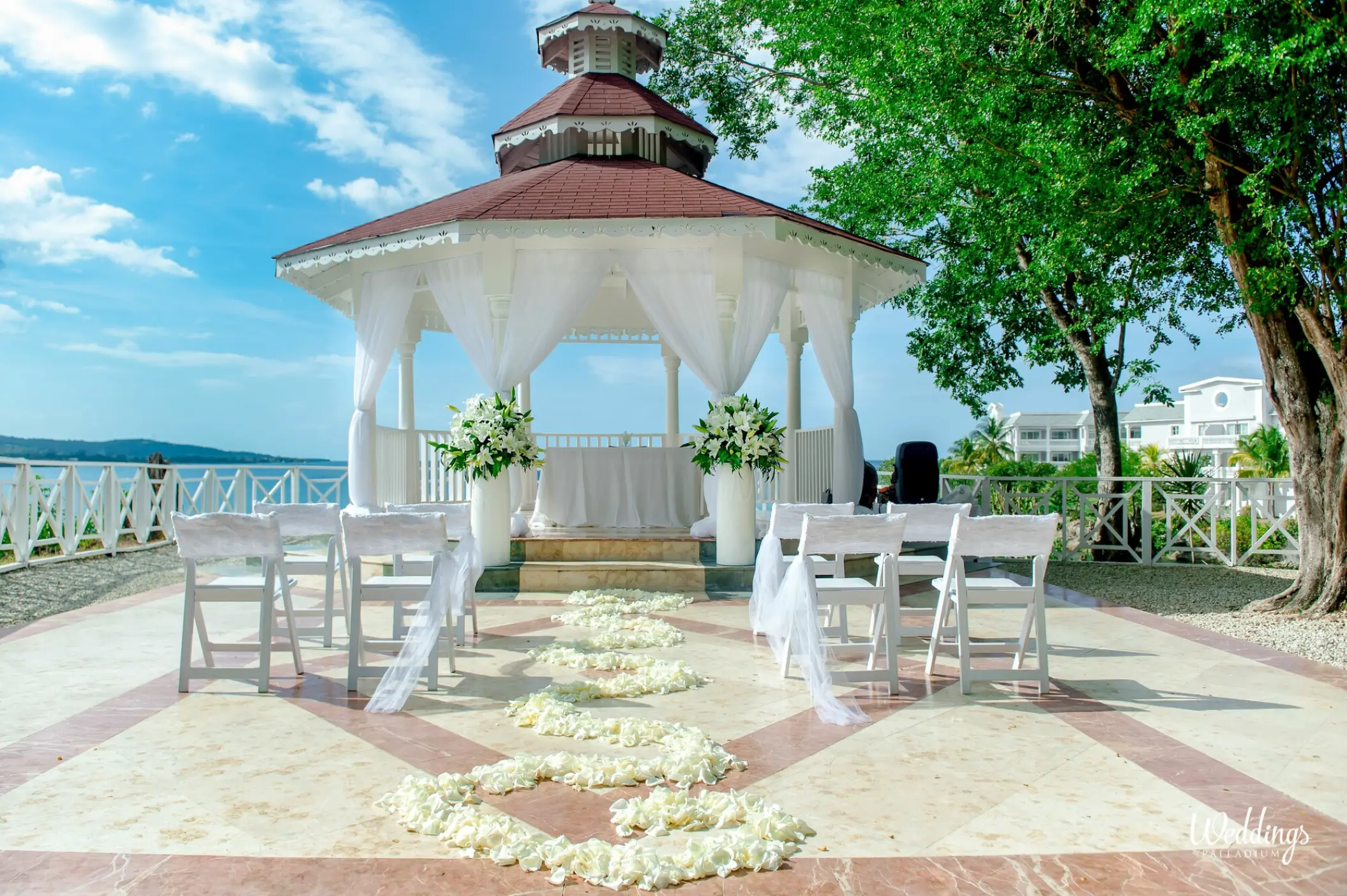 White oceanfront wedding gazebo ceremony at Grand Palladium Jamaica, Ocho Rios