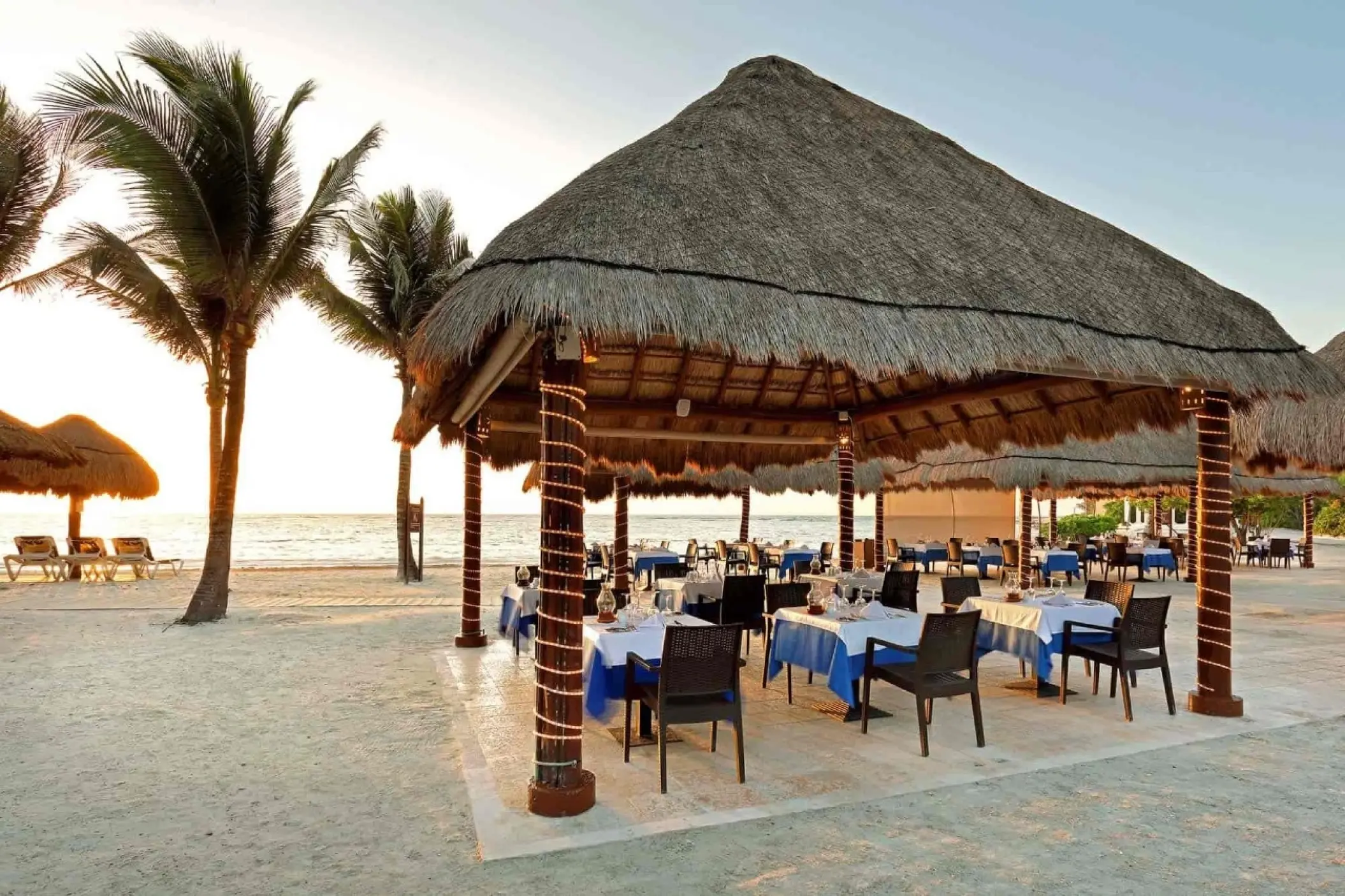 Open-air beachfront restaurant with palapa roof at Grand Palladium Kantenah, Riviera Maya