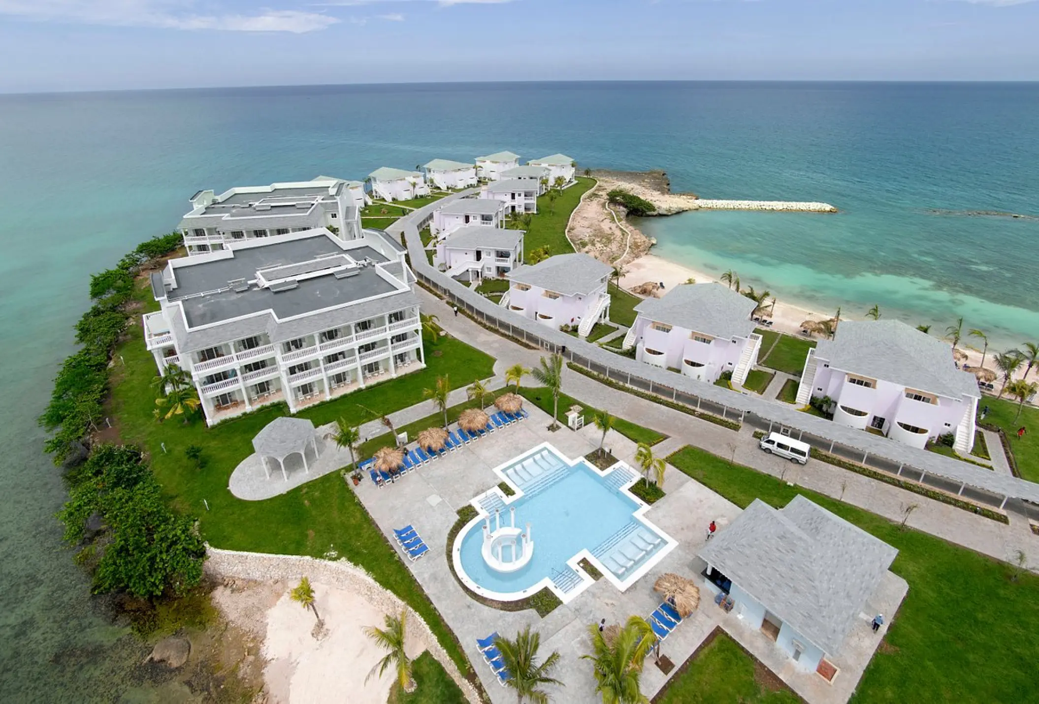 Aerial view of Grand Palladium Lady Hamilton resort buildings, pool and beachfront, Ocho Rios