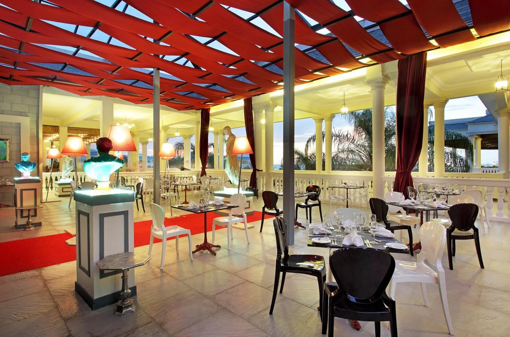 Arte e Cucina restaurant dining area with a red fabric ceiling at Grand Palladium Lady Hamilton, Ocho Rios
