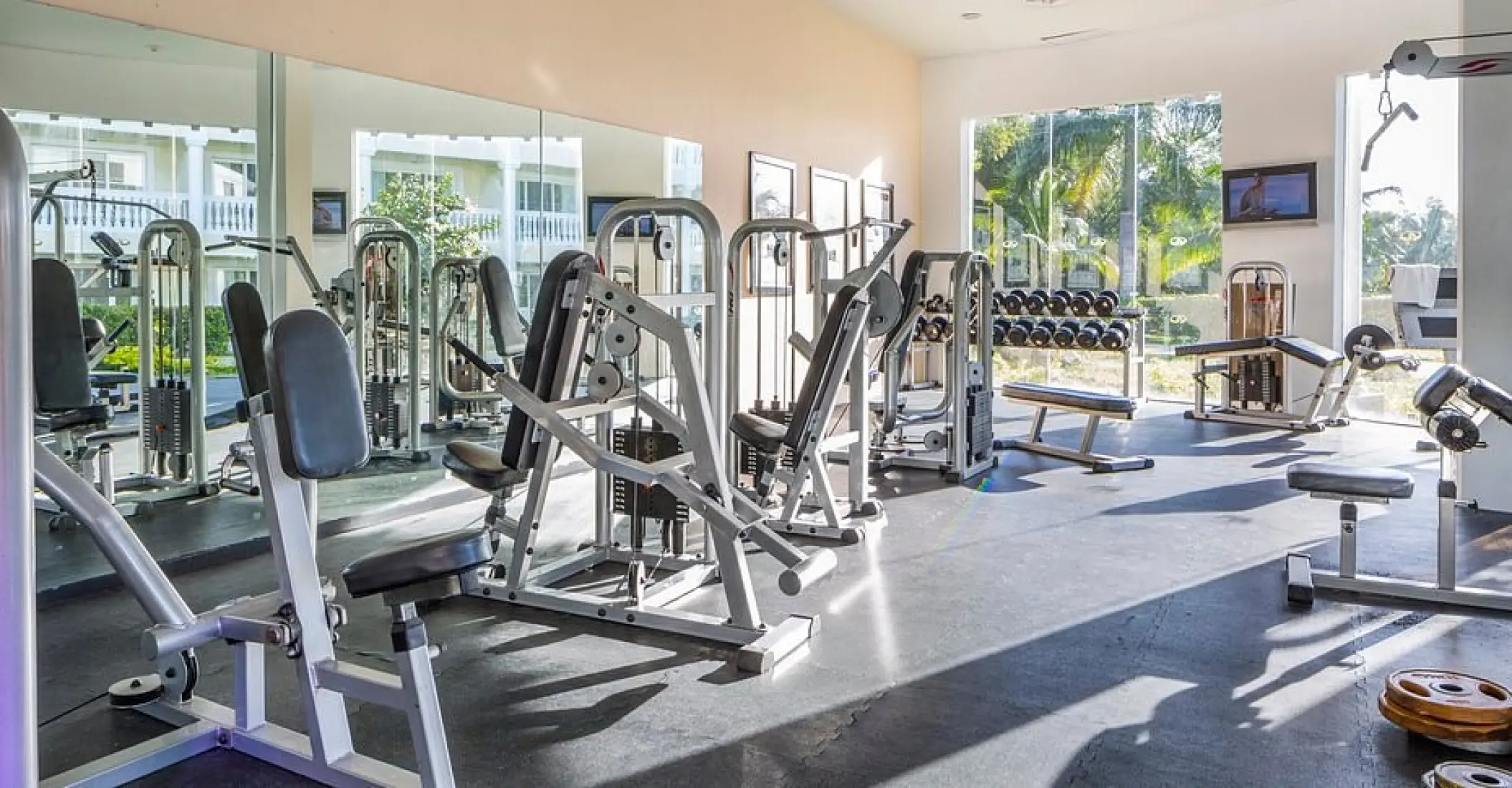 Grand Palladium Lady Hamilton fitness center with weight machines and large windows, Ocho Rios