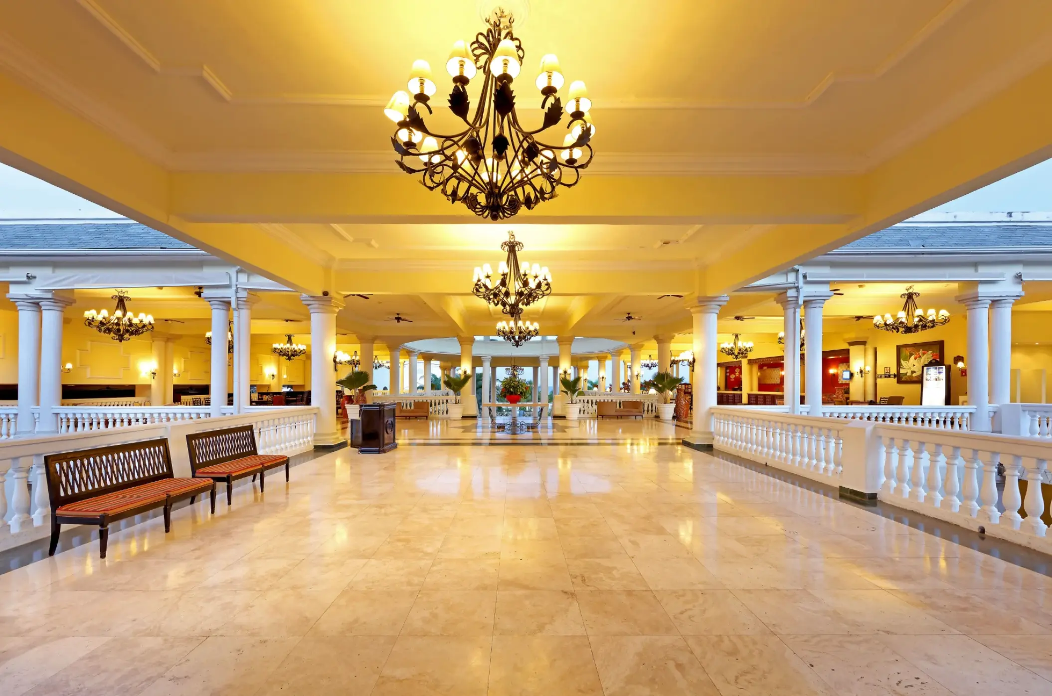 Grand Palladium Lady Hamilton lobby with white columns and chandeliers, Ocho Rios