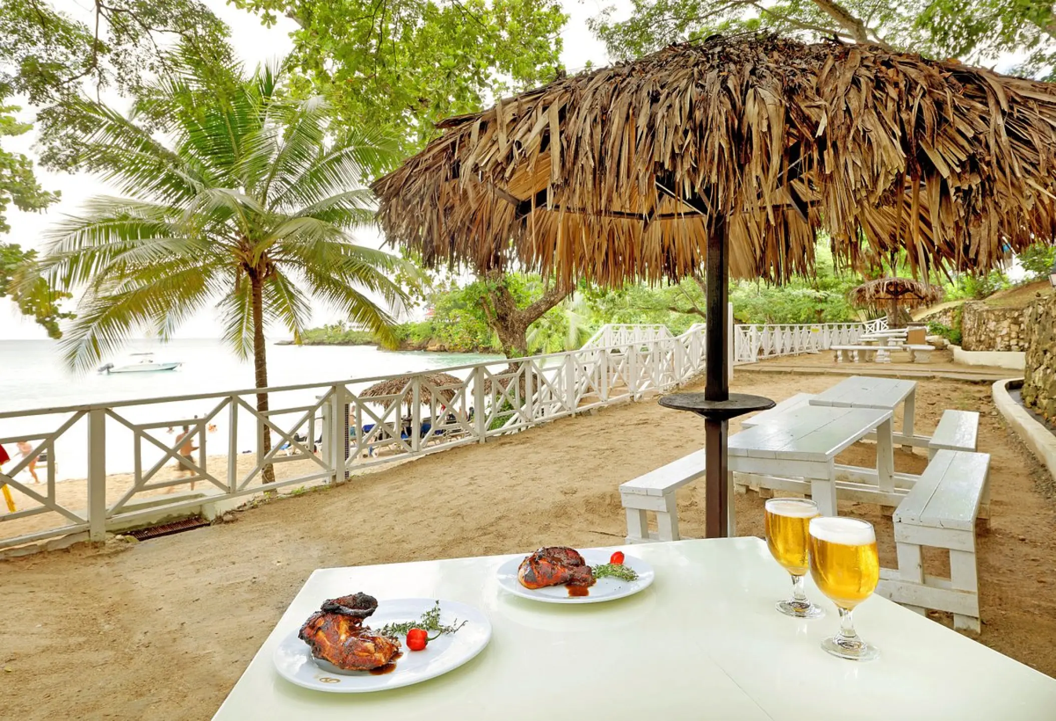 Jerk chicken and beers at the beach restaurant in Grand Palladium Lady Hamilton, Ocho Rios