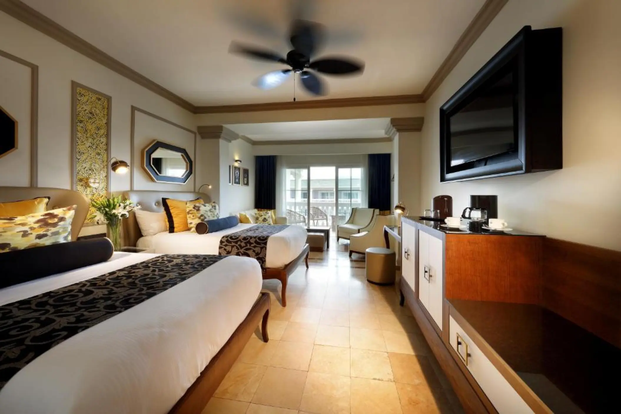 Guest suite with two double beds and a private balcony at Grand Palladium Lady Hamilton, Ocho Rios