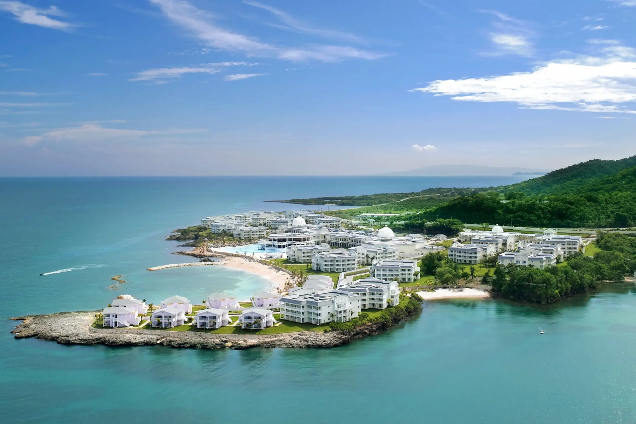 Aerial view of Grand Palladium Lady Hamilton beachfront buildings and coves, Ocho Rios