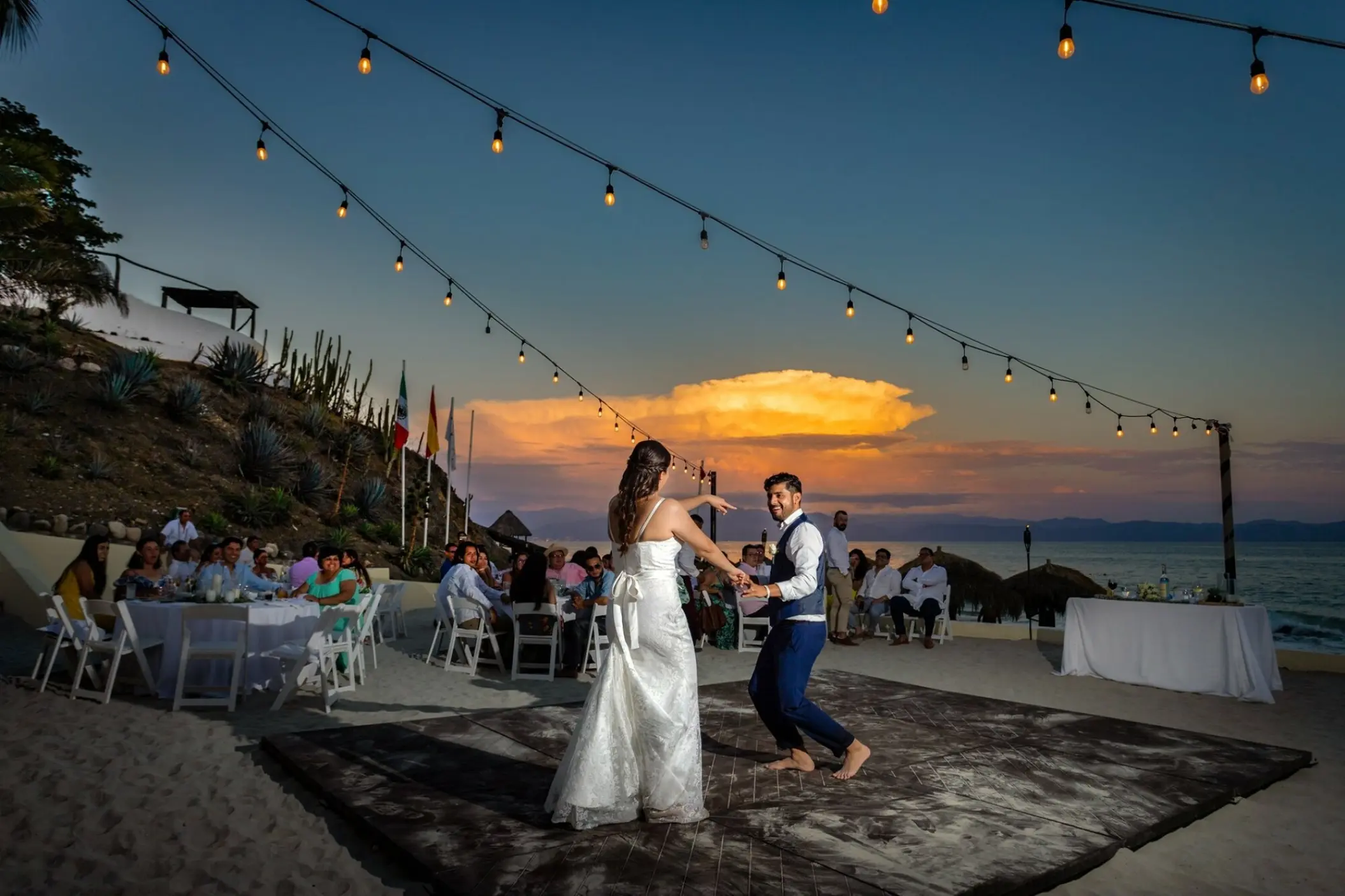 Wedding reception first dance on a beach terrace at Grand Palladium Vallarta, Puerto Vallarta