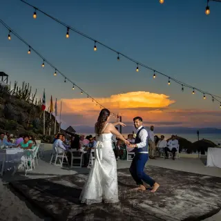 Wedding reception first dance on a beach terrace at Grand Palladium Vallarta, Puerto Vallarta