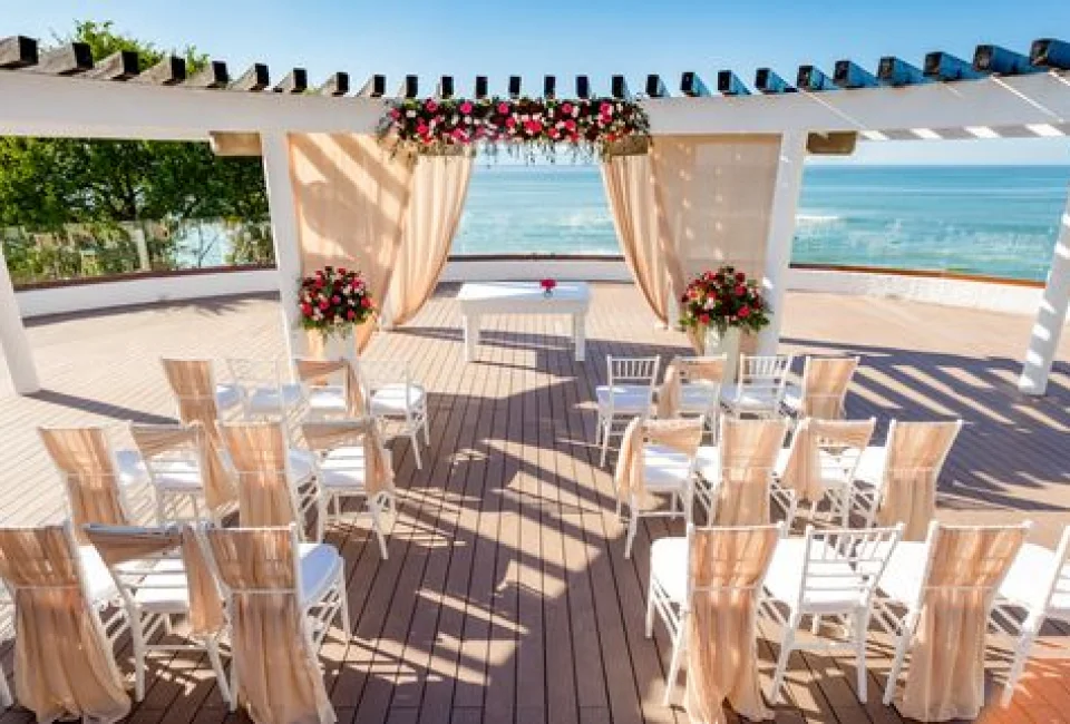 Ceremony decor on sunset sky terrace at grand palladium vallarta