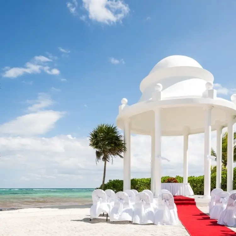 White beachfront gazebo wedding ceremony at Grand Palladium White Sand, Riviera Maya
