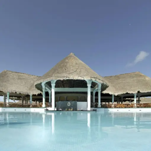 Grand Palladium White Sand pool bar and thatched roof structure by the swimming pool, Riviera Maya