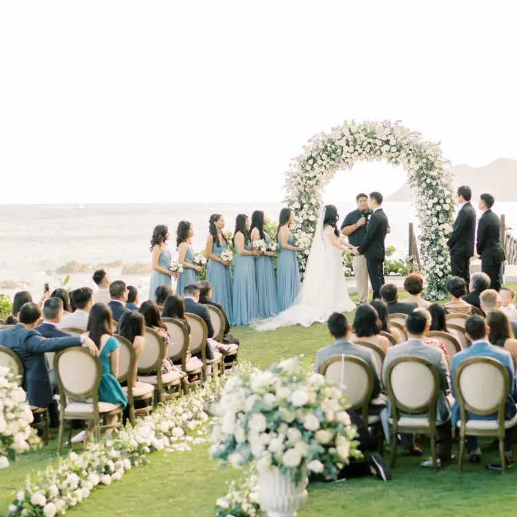 Oceanfront garden wedding ceremony at Grand Velas Los Cabos, Cabo San Lucas