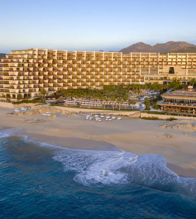 Grand Velas Los Cabos beachfront exterior and tiered ocean-view suites, Cabo San Lucas