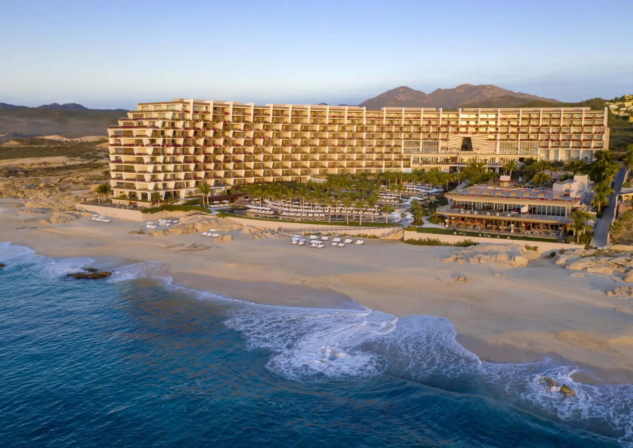 Grand Velas Los Cabos beachfront exterior and tiered ocean-view suites, Cabo San Lucas