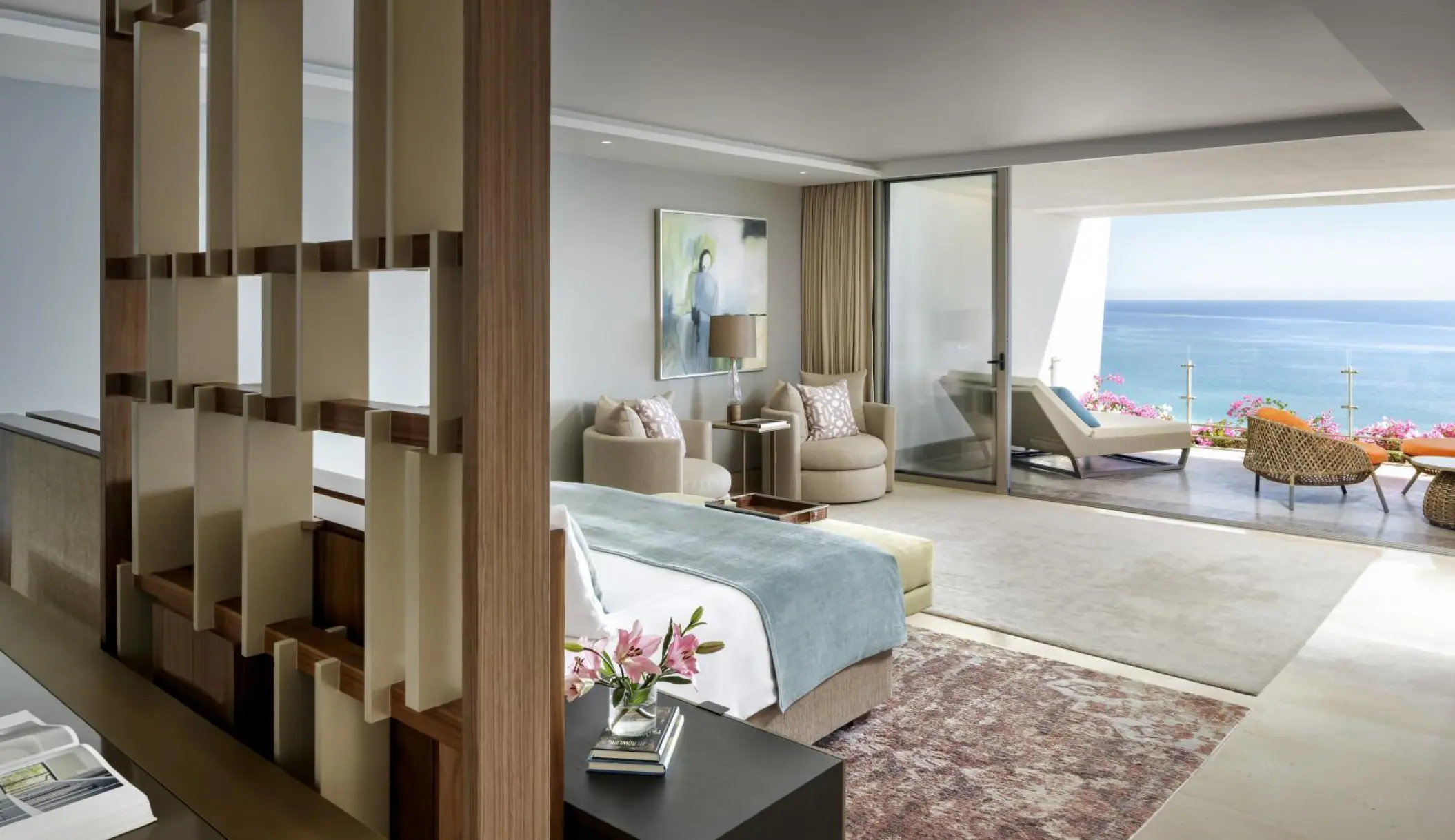 Royal Suite with ocean-view balcony and terrace seating at Grand Velas Los Cabos, Cabo San Lucas
