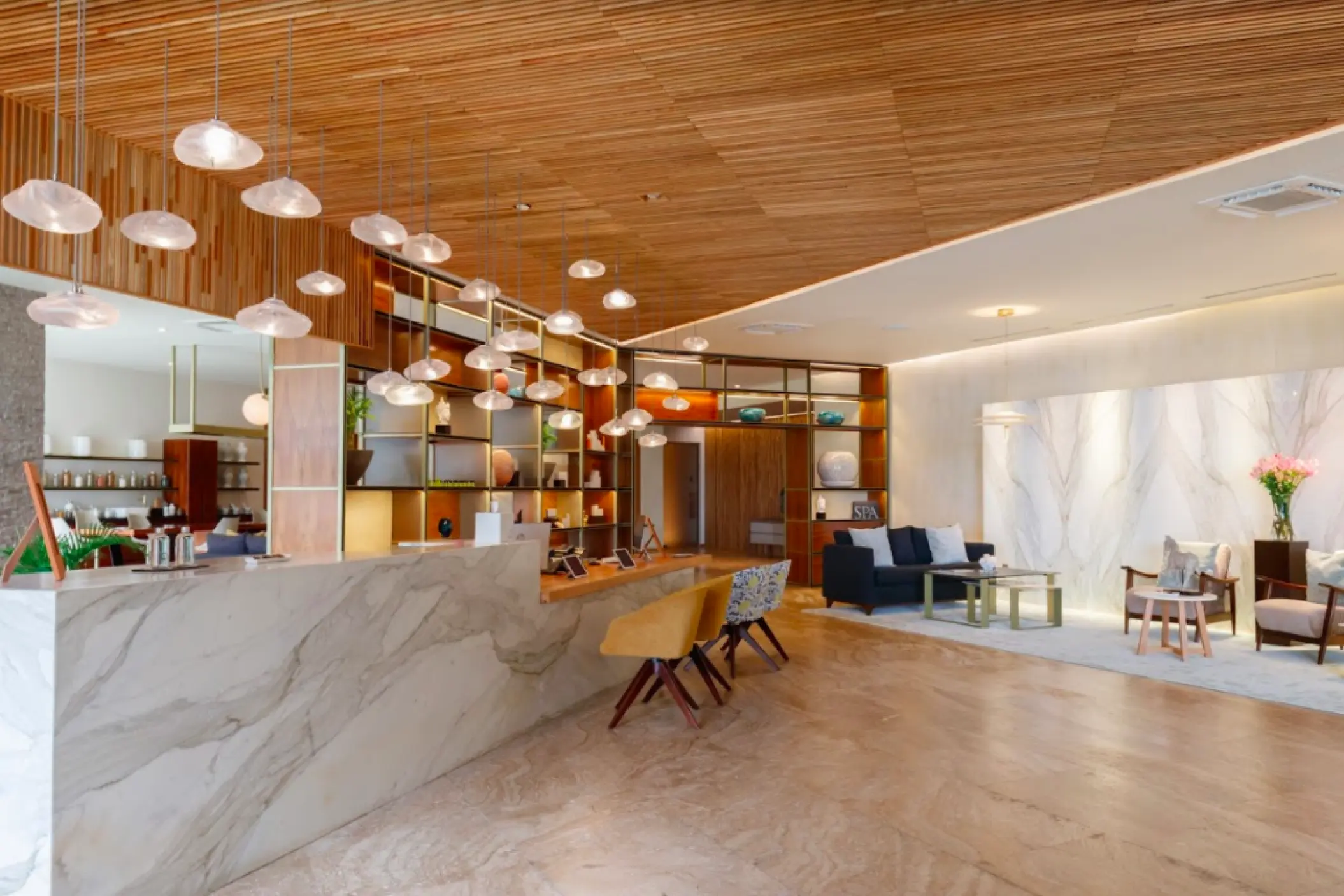 Grand Velas Los Cabos spa reception with marble counter and modern lighting, Cabo San Lucas