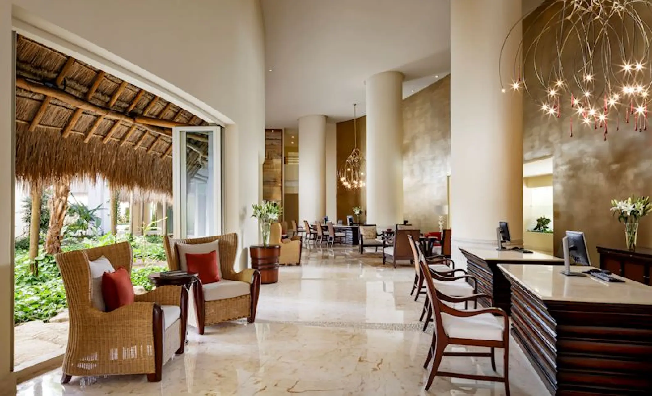 Grand Velas Riviera Maya lobby with high ceilings, marble floors and wicker seating, Riviera Maya