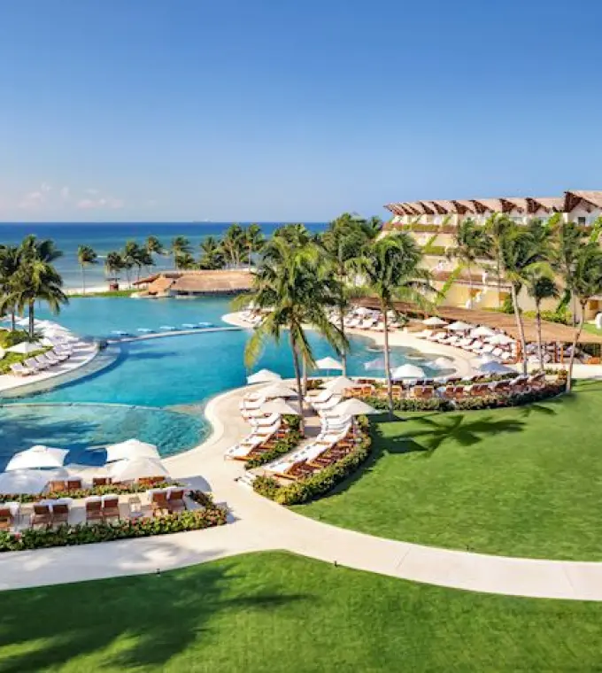 Grand Velas Riviera Maya lagoon-style pool and gardens overlooking the Caribbean sea