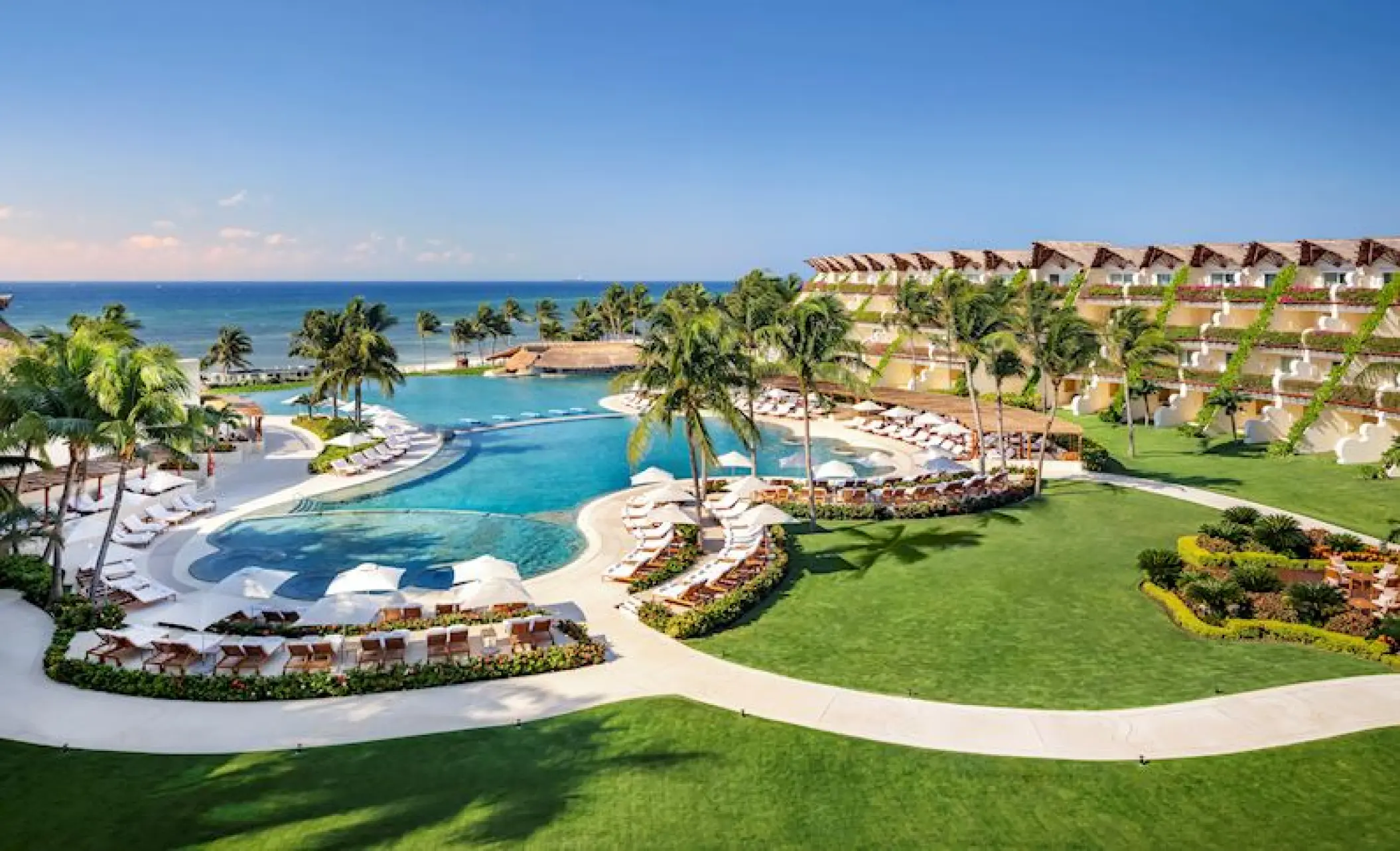 Grand Velas Riviera Maya lagoon-style pool and gardens overlooking the Caribbean sea