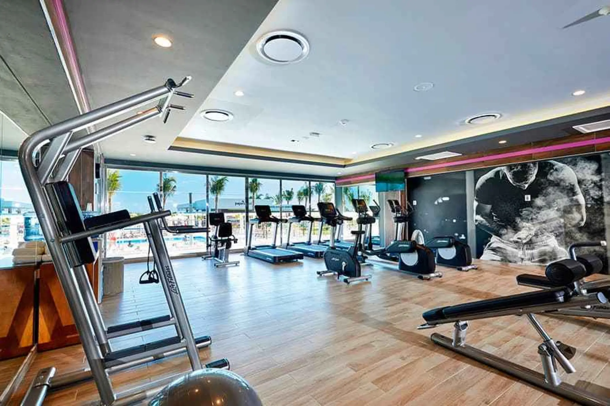 Fitness center with treadmills and weight machines at Riu Palace Costa Mujeres, Cancun