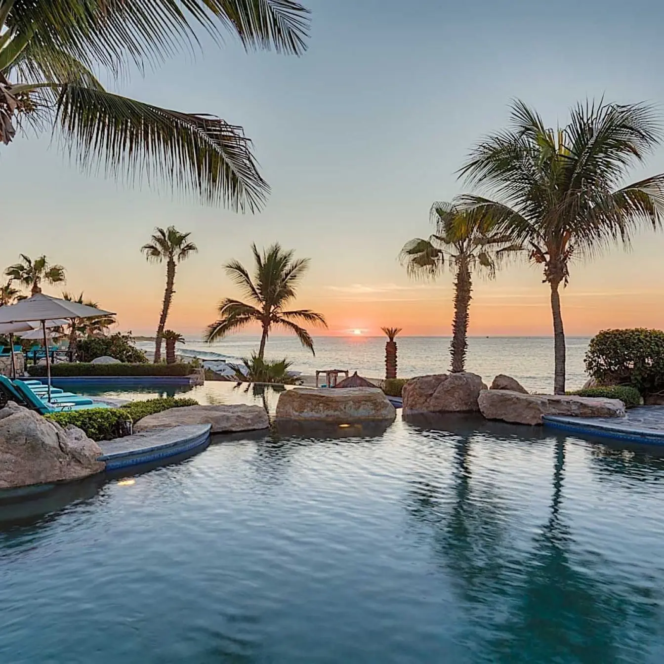 Hacienda del Mar Los Cabos infinity pool at sunset overlooking the ocean, Cabo San Lucas