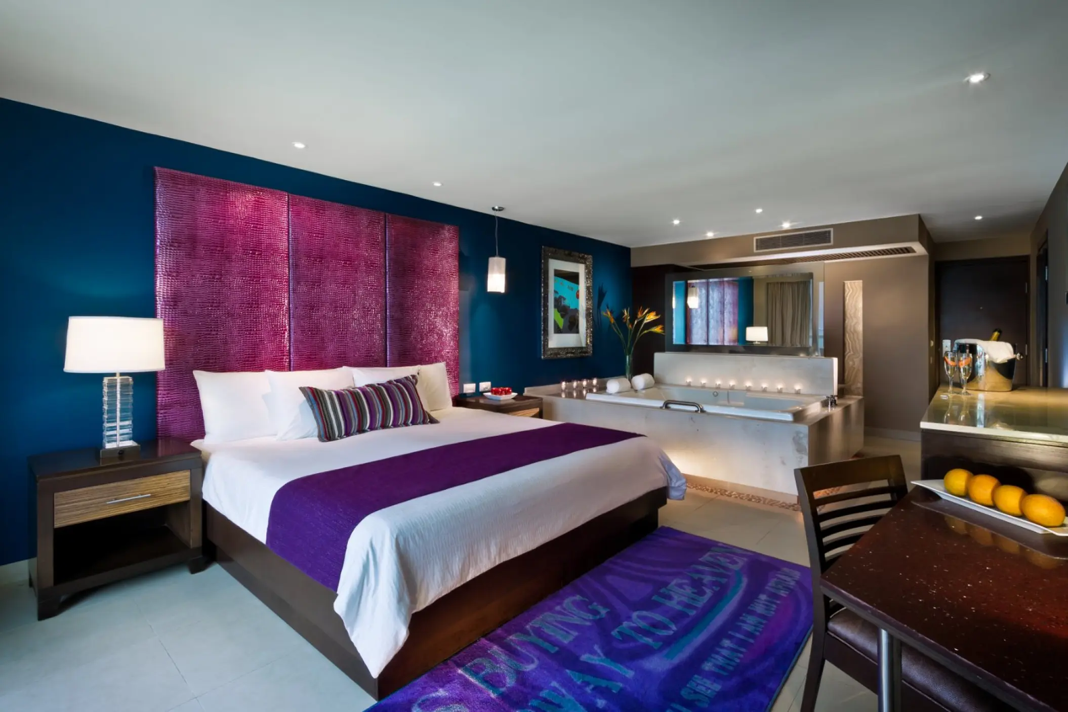 Hard Rock Cancun guest suite featuring a king bed and indoor hydro spa tub, Cancun