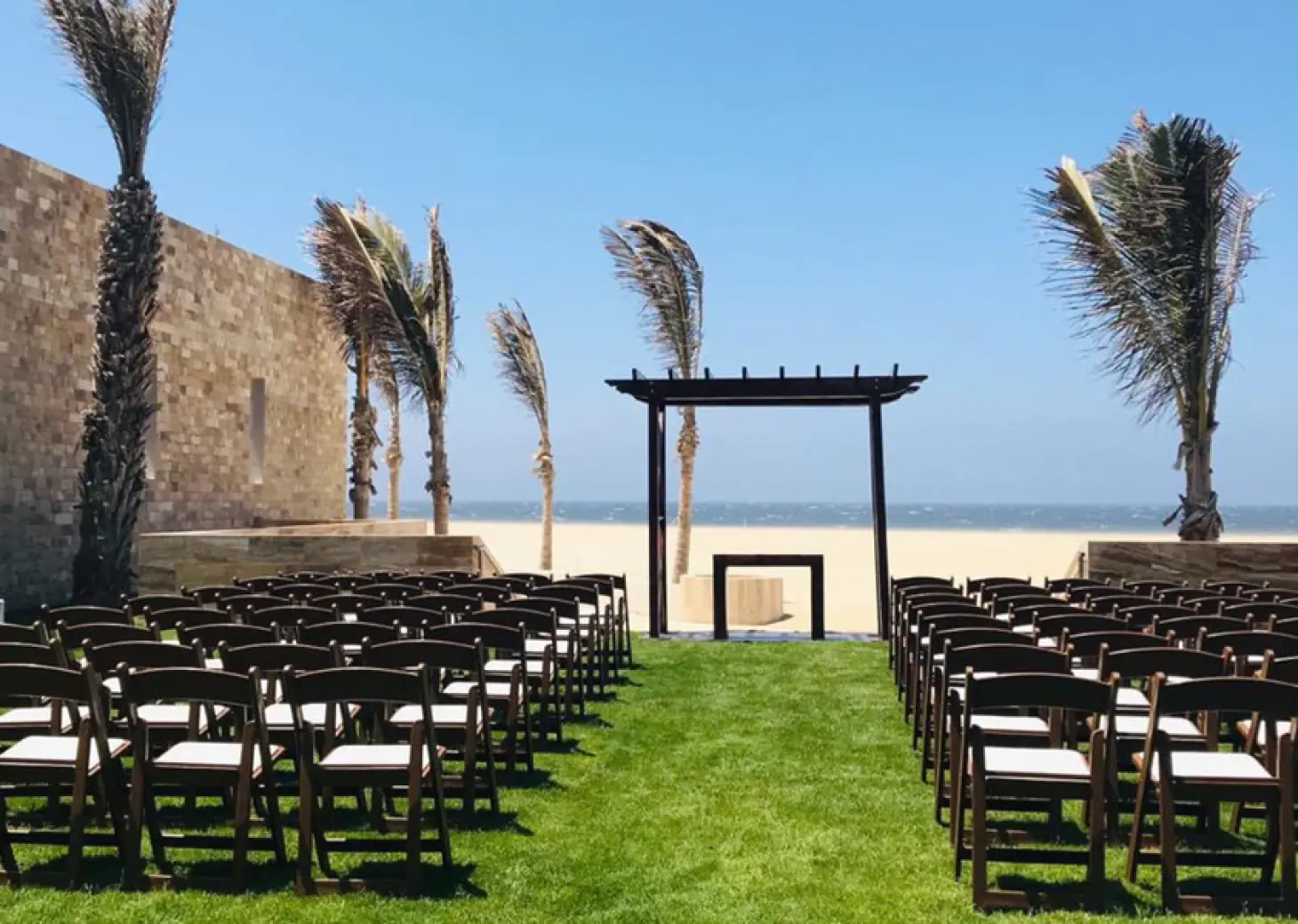 Coba Garden wedding ceremony setup with beach views at Hard Rock Los Cabos, Cabo San Lucas