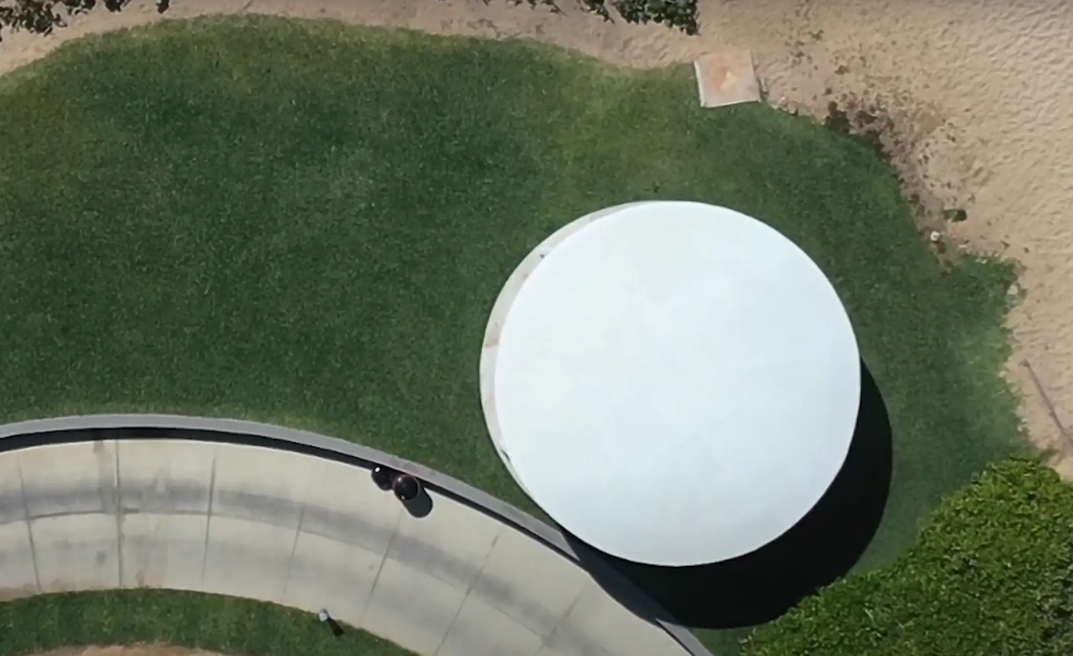 Overhead view of a white circular gazebo and stone path at Hard Rock Los Cabos, Cabo San Lucas