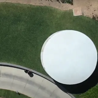 Overhead view of a white circular gazebo and stone path at Hard Rock Los Cabos, Cabo San Lucas
