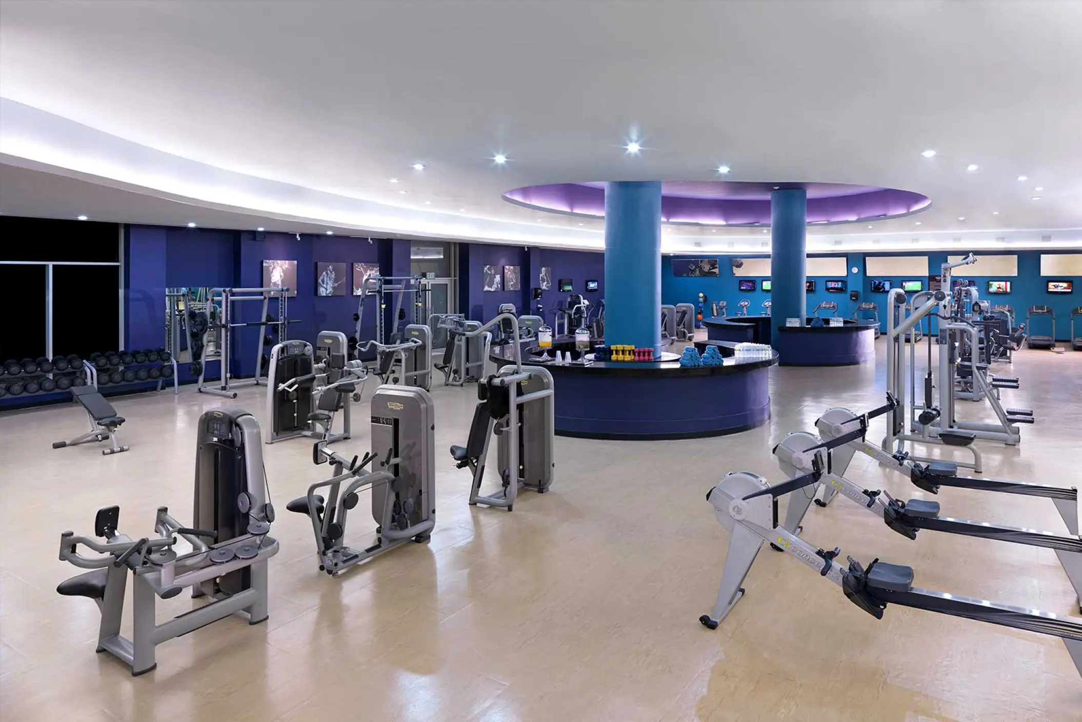 Spacious indoor fitness center with exercise equipment at Hard Rock Hotel Punta Cana