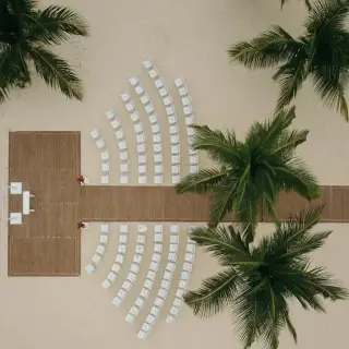 Aerial view of a beach wedding ceremony setup at Hard Rock Punta Cana