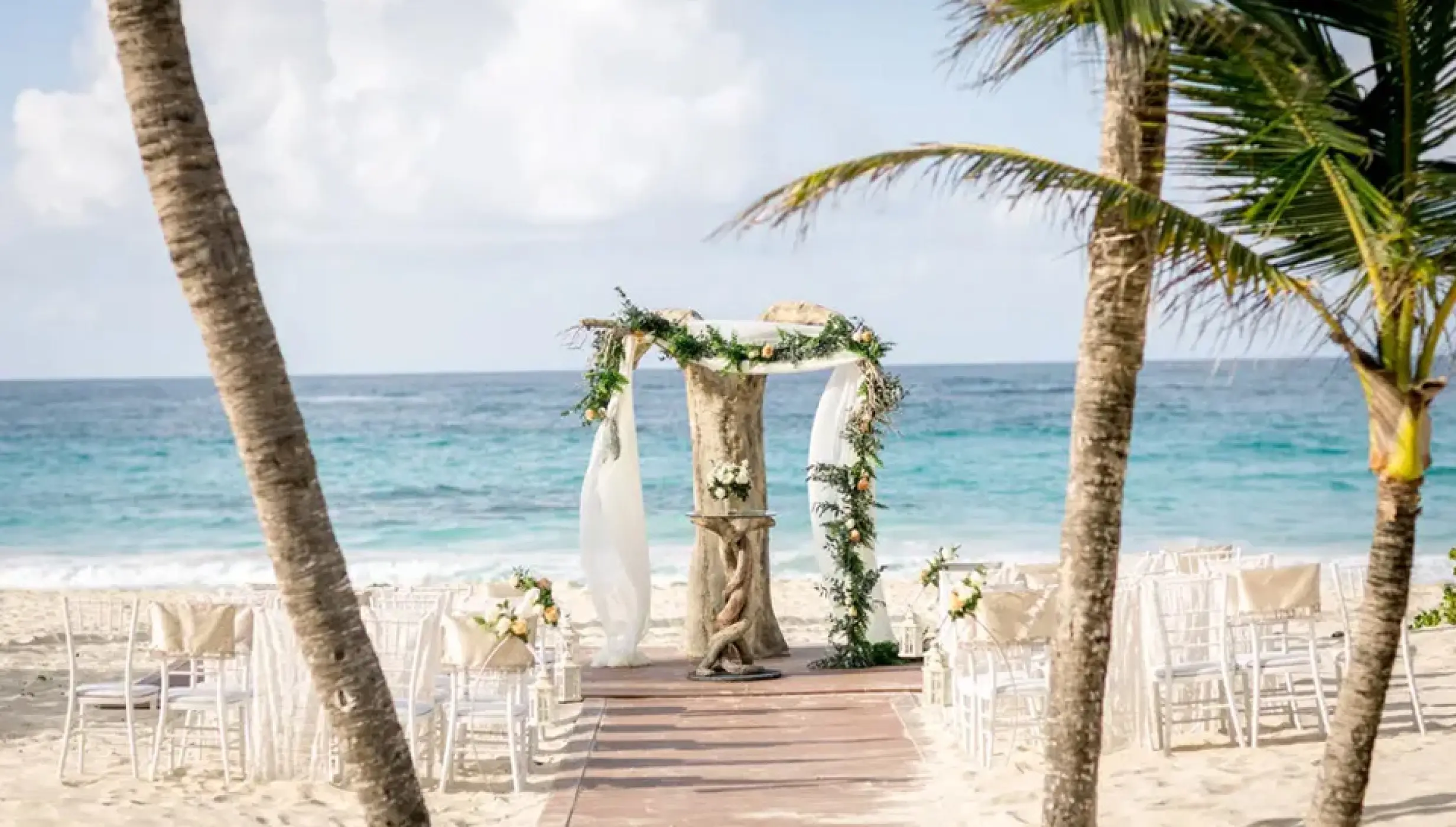 Ceremony decor on harmonica palafite wedding venue at Hard Rock Punta Cana