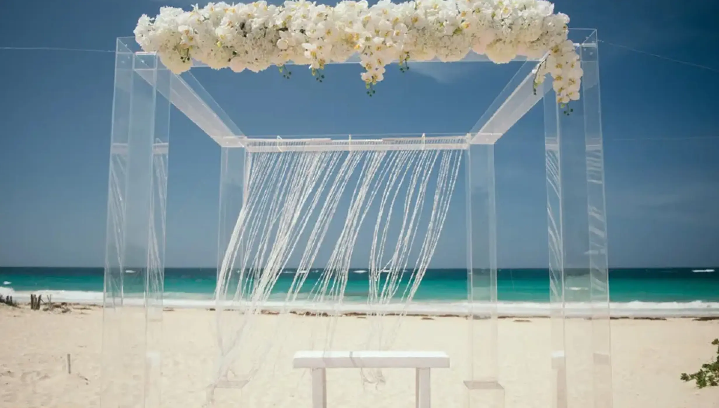 Ceremony decor on harmonica palafite wedding venue at Hard Rock Punta Cana