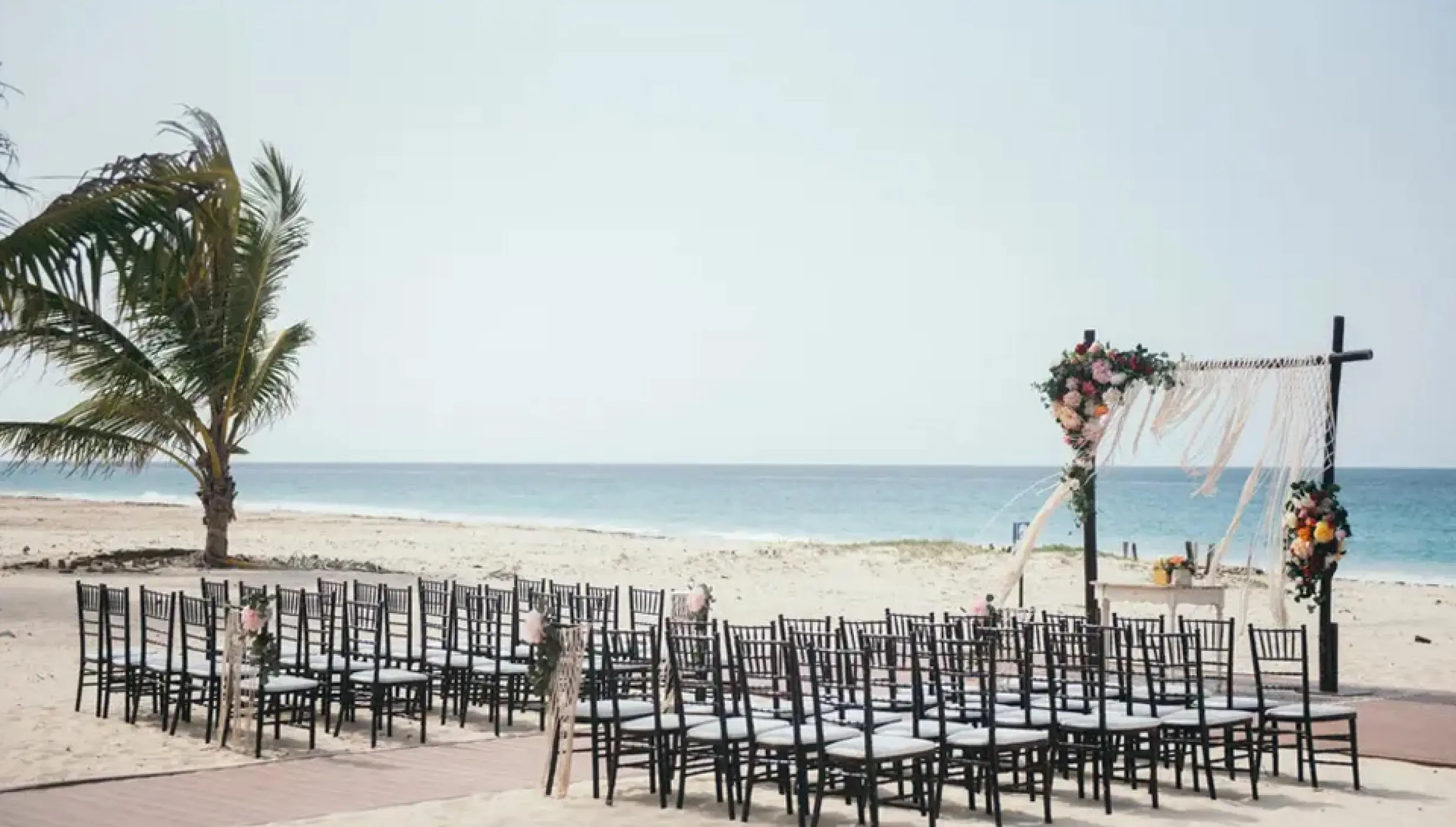 Ceremony decor on harmonica palafite wedding venue at Hard Rock Punta Cana