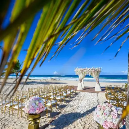 Beachfront wedding ceremony with a floral gazebo at Hard Rock Hotel Punta Cana, Punta Cana
