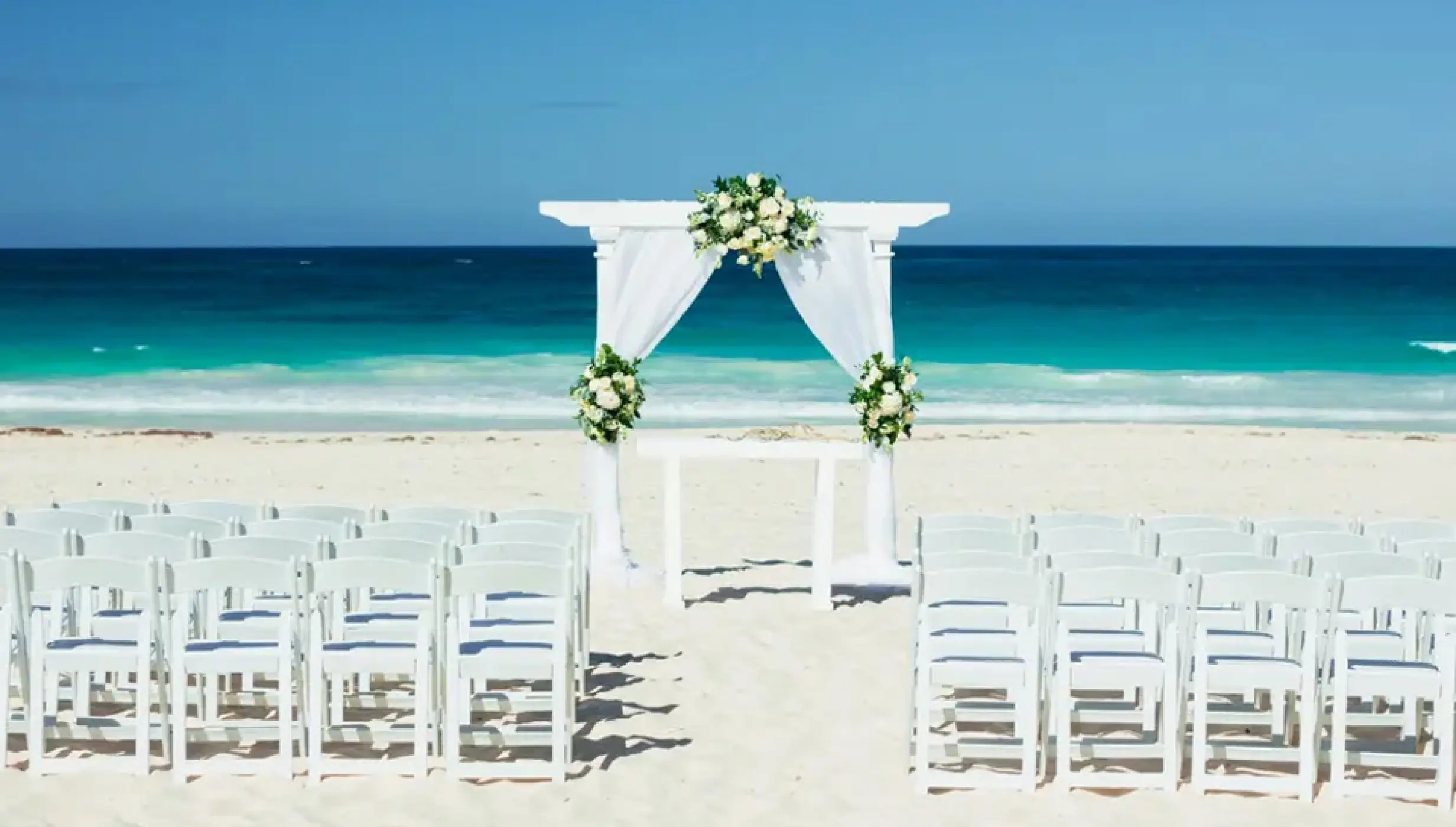 Ceremony decor on Isle beach wedding venue at Hard Rock Punta Cana