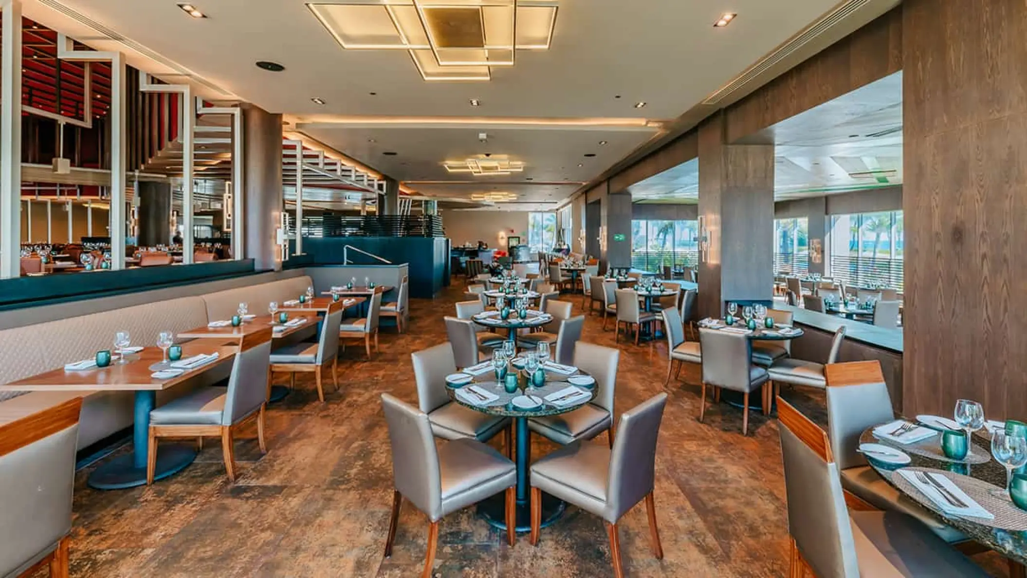 Toro restaurant dining room with modern wood paneling at Hard Rock Punta Cana