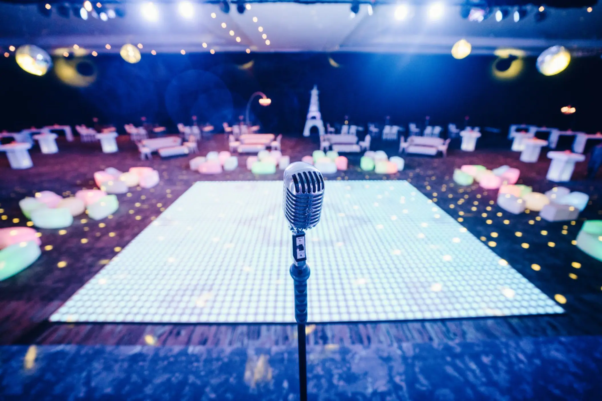 Microphone in front of an LED dance floor for a wedding reception at Hard Rock Hotel Riviera Maya