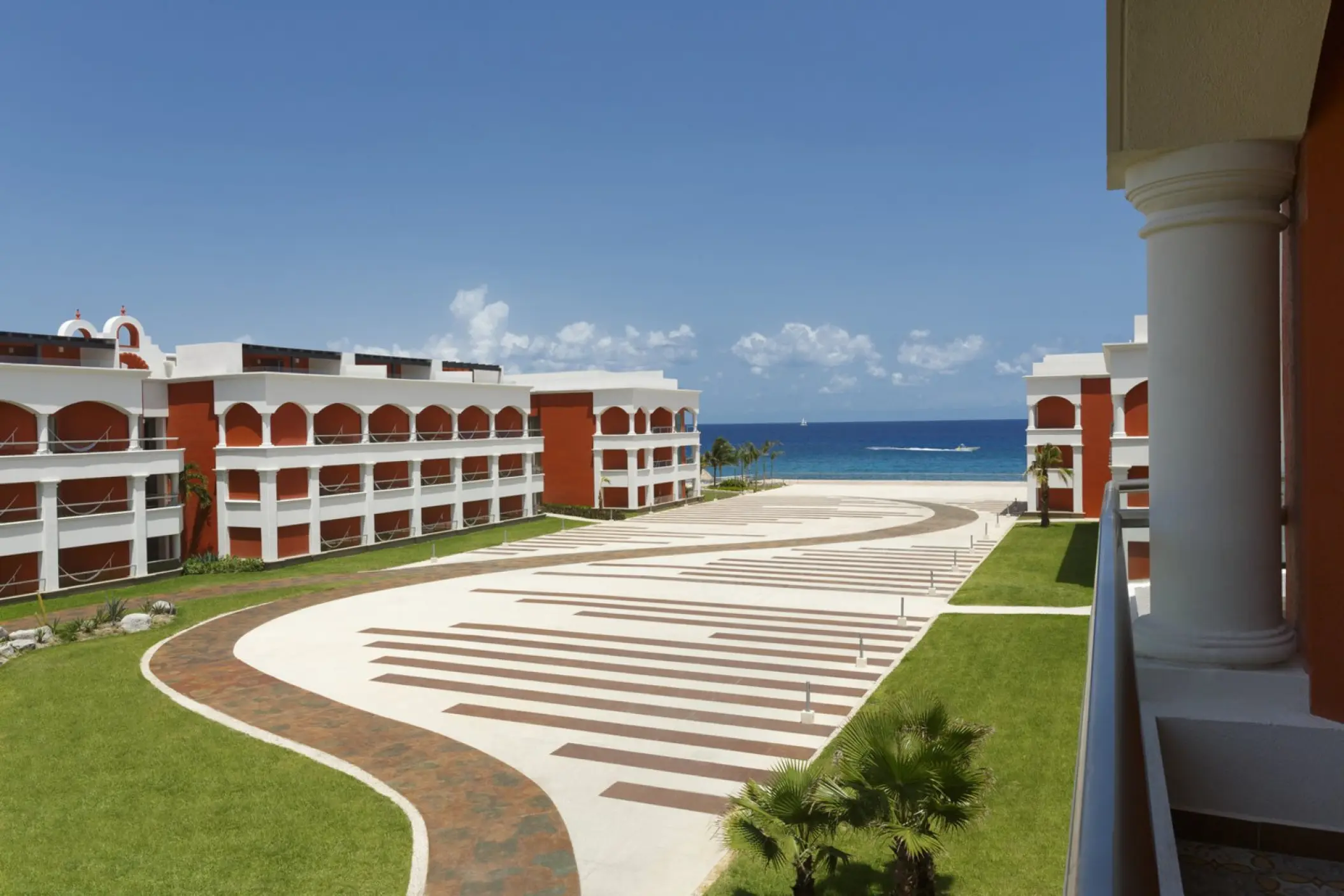 Woodstock Terrace courtyard and guest buildings at Hard Rock Riviera Maya