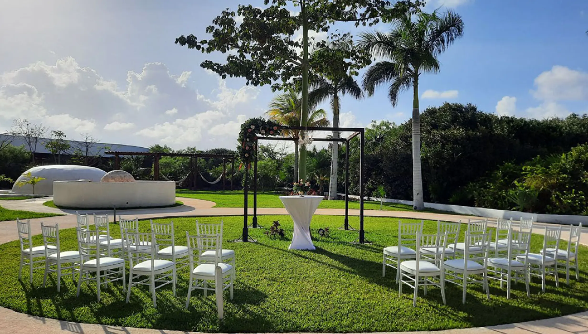 Ceremony setup in La Ceiba Garden venue at Haven Riviera Cancun Resort.