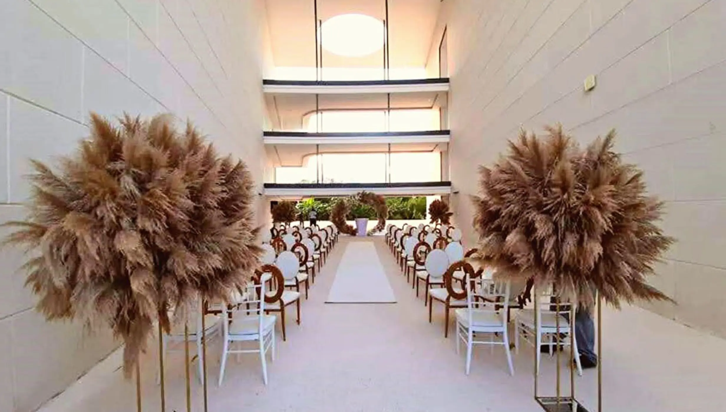 Ceremony setup on The H Arch venue at Haven Riviera Cancun Resort.