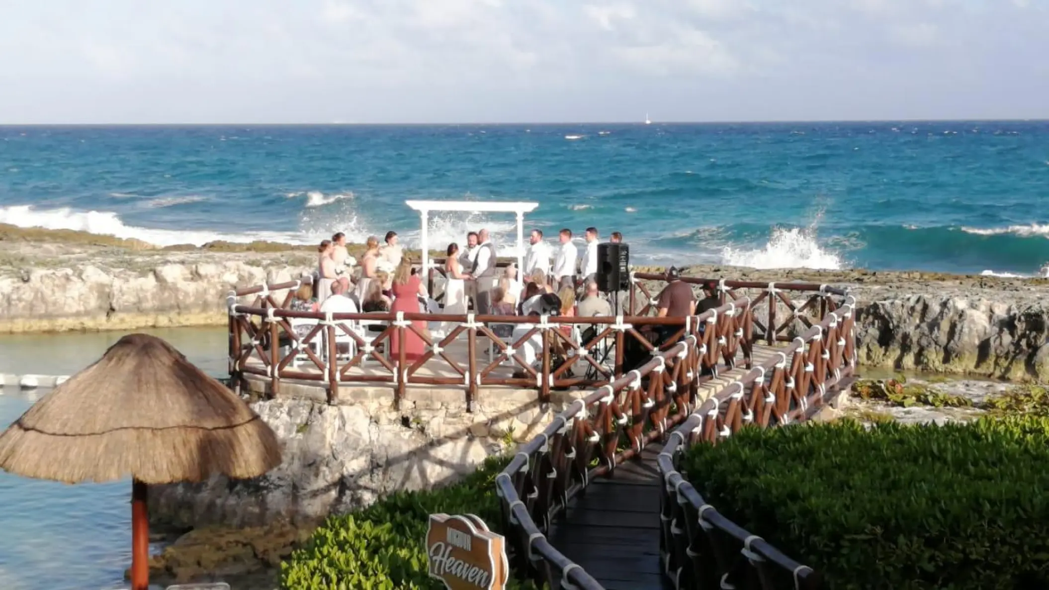 Rocky terrace wedding ceremony overlooking the ocean at Hard Rock Riviera Maya
