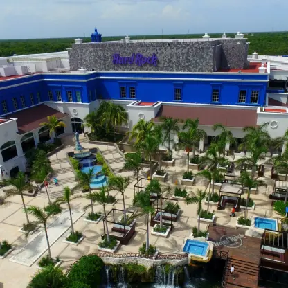 Aerial view of the Heaven section courtyard and blue facade at Hard Rock Riviera Maya