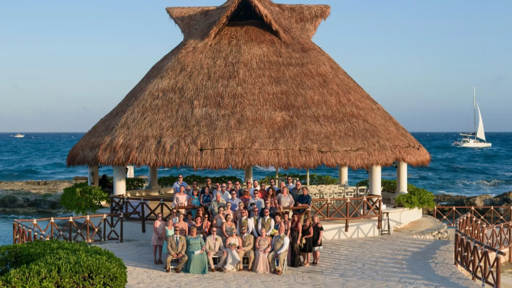Large group wedding photo at the Heaven Terrace palapa in Hard Rock Hotel Riviera Maya