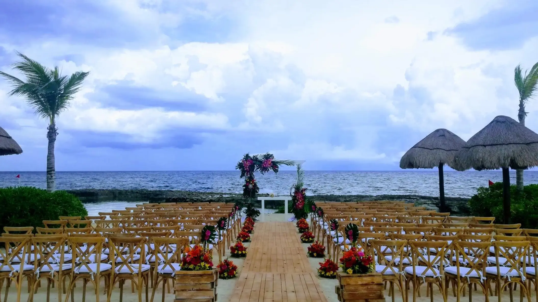 Oceanfront wedding ceremony setup on Starlight Beach at Hard Rock Riviera Maya
