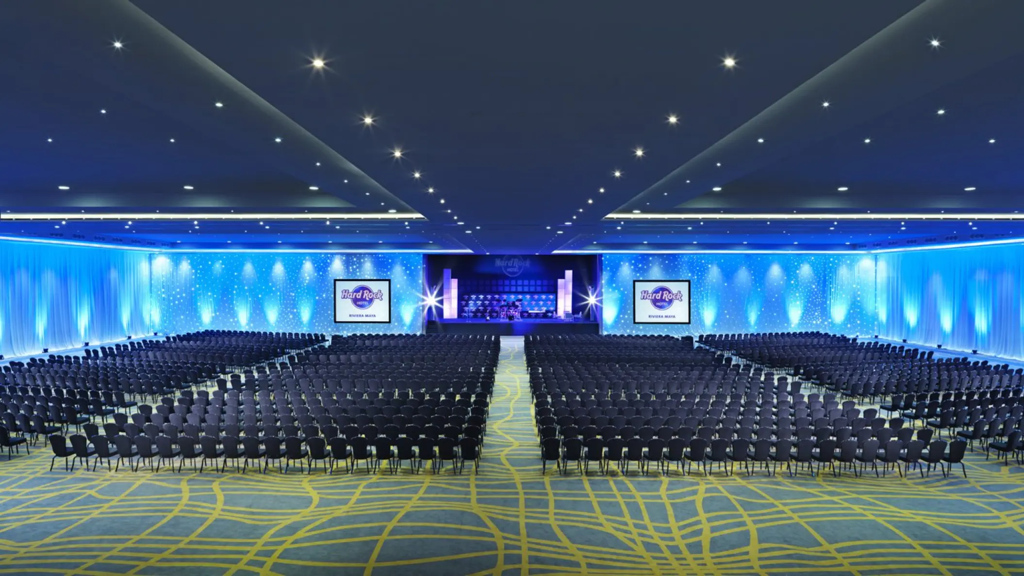 Large ballroom reception with blue lighting at Hard Rock Riviera Maya