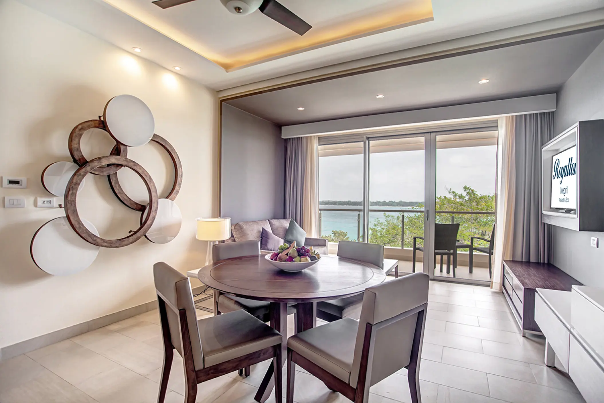 Presidential suite dining area and balcony overlooking the ocean at Royalton Hideaway Negril
